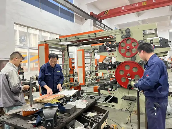 technicians test and proof flexo printing machine for printing precision